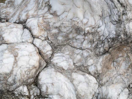 raw aged white marble stone with abstract patternの写真素材