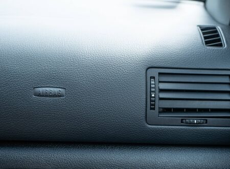 dashboard panel inside car with airbag sign. safety and vehicle insurance concept