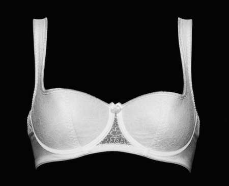 Fashion women's lingerie of white color on a black background.の写真素材