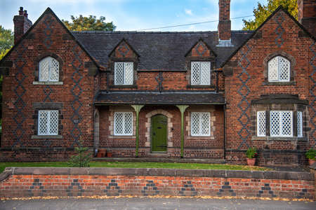 Old, vintage block of red brick houses in town of Sandbach, Stafordshire, UK.の写真素材