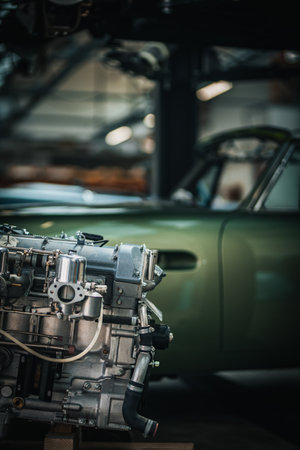 Newly restored engine for a classic car in a background stored in a restauration garage.の写真素材