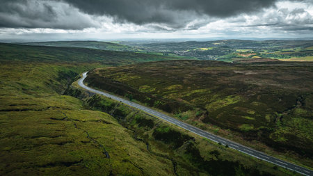 Aerial view of curvy windy roads on a moody summer day in Yorkshire, UK