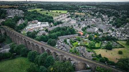 Rail viaduct going through the small town in Yorkshire, Denby Dale, Huddersfield, UKの写真素材