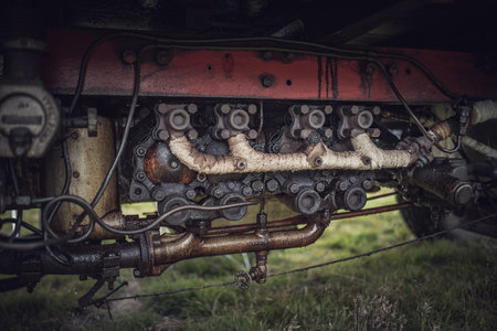 Old truck steam engine in a vintage classic steam tractor show.