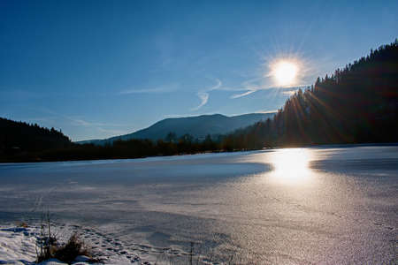 Winter sunset over the Brezova reservoir near Karlovy Varyの写真素材