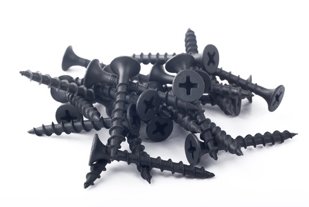 Heap of screws on a white backgroundの写真素材