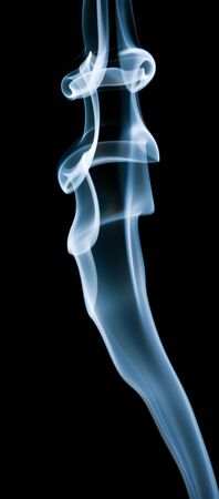 Smoke of cigarette on a black backgroundの写真素材