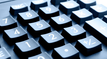 Buttons close up of the calculator with dark blue toningの写真素材