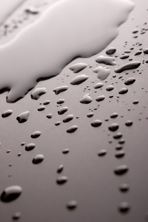 Macro of water drops.Dew on blackの写真素材