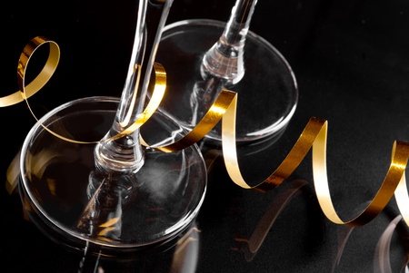 Wineglass and decoration gold ribbonの写真素材
