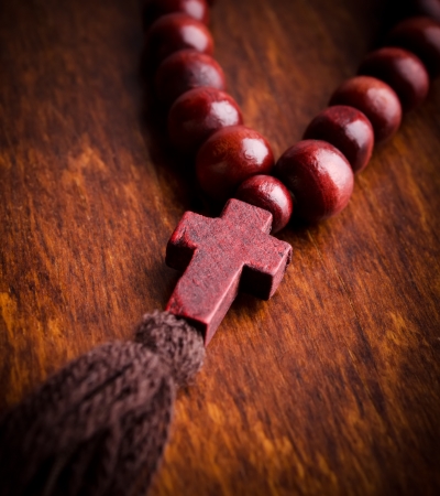 Wooden rosary and cross closeupの写真素材
