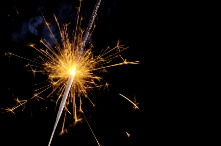 Christmas and new year party sparkler on black backgroundの写真素材