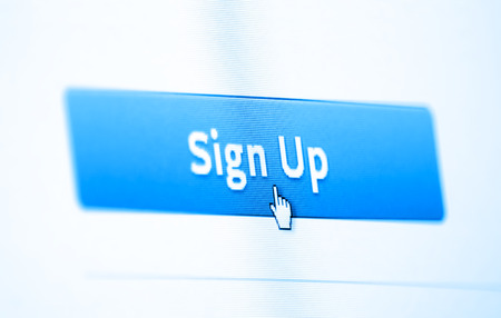 Closeup photo of cursor in internet browser click to sign up