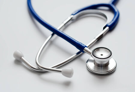 Medical equipment stethoscope on whiteの写真素材