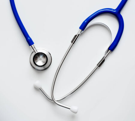 Medical equipment stethoscope on whiteの写真素材