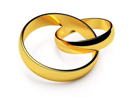 Golden wedding rings on a whiteの写真素材
