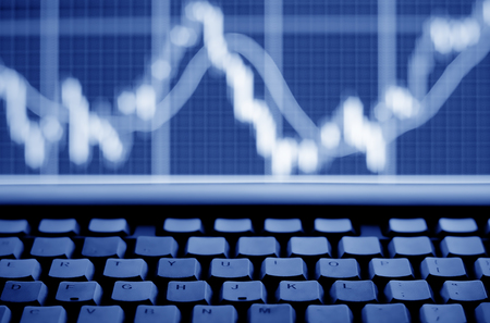 Stock exchange graph on laptop screenの写真素材