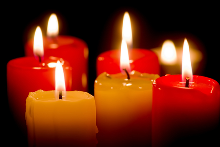 Closeup of burning color candlesの写真素材