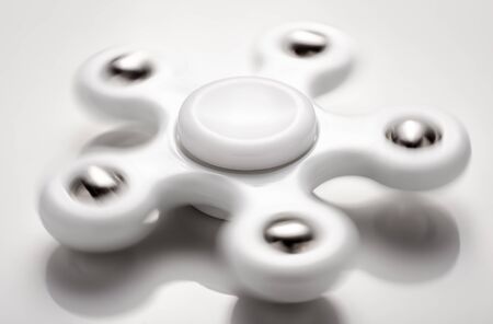 Spinner fidget toy closeup.Blur motionの写真素材