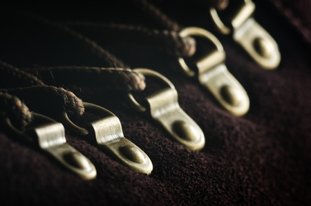 Close-up photo of brown shoelaces on bootの写真素材