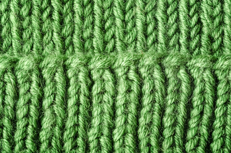 Green knitted clothing texture