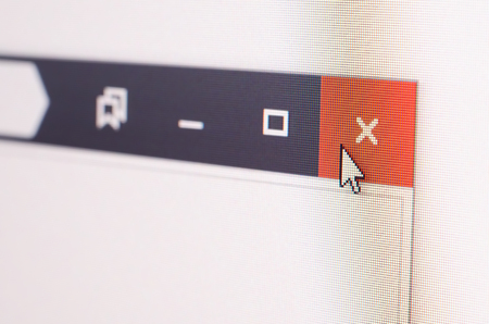 Closeup photo of cursor in internet browser click to closing cross.
