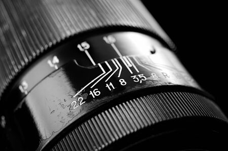 Old photo lens and focus scale closeup