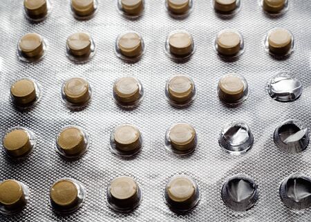 Open pack of pills closeup