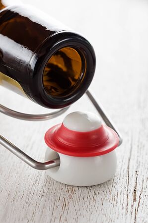 Beer bottle opened with stirrup capの写真素材