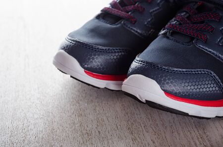 Two children's sneakers close up.の写真素材