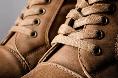 Closeup lace of brown leather bootsの写真素材