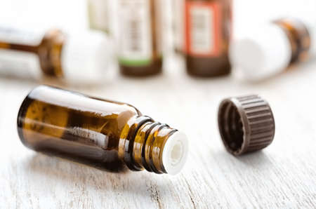 Aroma essential oil open bottle and capの写真素材