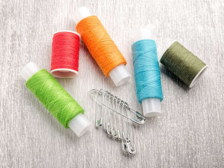 Reel of thread and pins for sewing and needleworkの写真素材