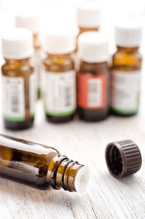 Aroma essential oil open bottle and capの写真素材