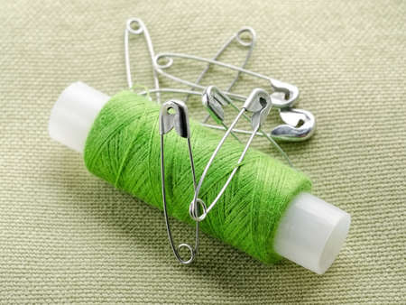 Reel of thread and pins for sewing and needleworkの写真素材