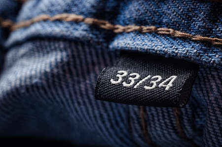 33-34 sizeclothes label on blue denim pants