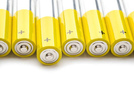 Alkaline batteries closeup on white backgroundの写真素材