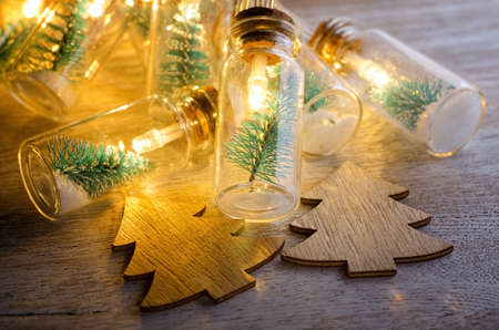 Christmas tree in glass jar glowing.の写真素材