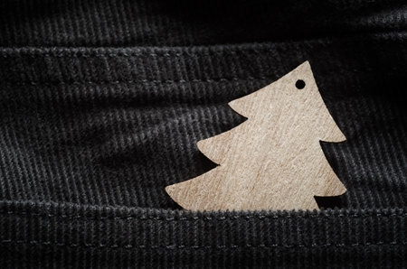 Wooden christmas fir on brown velvet textureの写真素材