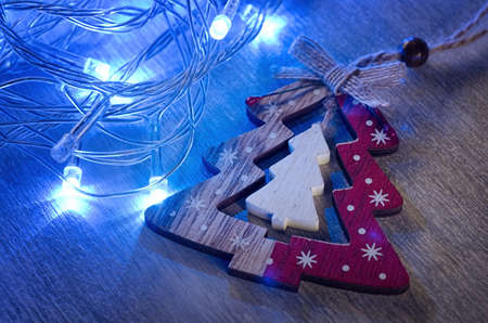 Christmas tree decor and glowing garlandの写真素材