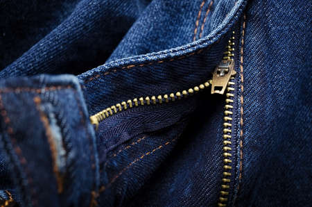 Closeup zipper on blue denim pantsの写真素材