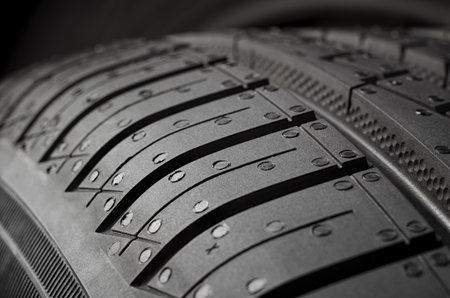 New car summer tire protector close upの写真素材