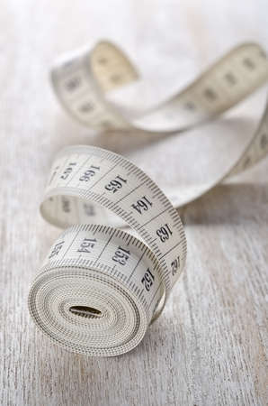 Closeup photo of white tapeline with black numbersの写真素材