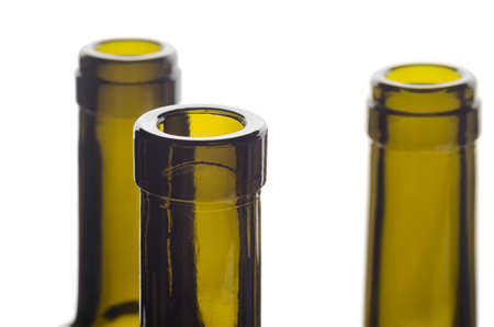 Uncorked wine bottles on isolated white backgroundの写真素材