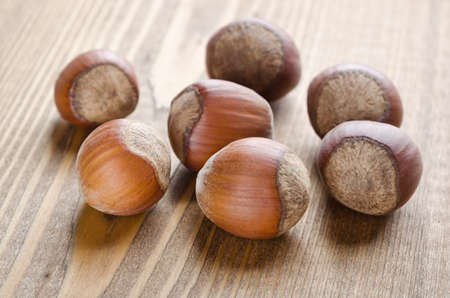 Hazelnut group closeup on a black backgroundの写真素材