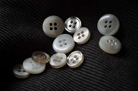 Heap of buttons on cloth