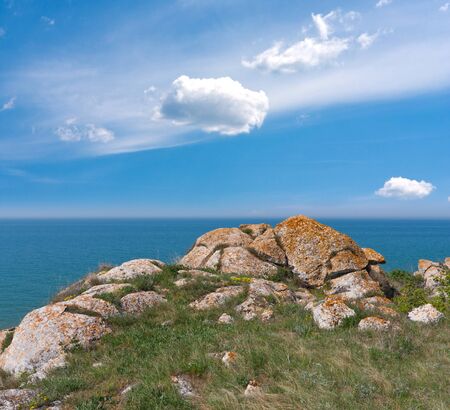 landscape with old stones near sea shoreの写真素材