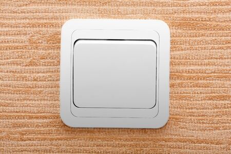 single switch mounted on room wall