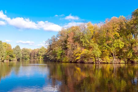 autumn on lake in parkの写真素材
