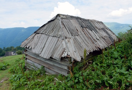 old wooden building in mountainsの写真素材